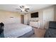 Main bedroom with large bed and walk-in closet at 14350 Easy Goer St, Ruskin, FL 33573