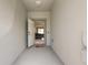 Inviting entryway with open door view into the main living area at 14350 Easy Goer St, Ruskin, FL 33573