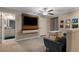 Loft area with a sitting area and built-in TV at 14350 Easy Goer St, Ruskin, FL 33573