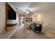 Spacious loft area with comfortable seating and built-in entertainment center at 14350 Easy Goer St, Ruskin, FL 33573