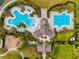 Community pool and lap pool with playground nearby at 14350 Easy Goer St, Ruskin, FL 33573