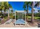 Relaxing poolside cabana with lounge chairs at 14350 Easy Goer St, Ruskin, FL 33573