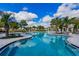Stunning freeform community pool with a relaxing atmosphere at 14350 Easy Goer St, Ruskin, FL 33573