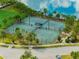Enjoy tennis in this community with courts near a lake at 14350 Easy Goer St, Ruskin, FL 33573