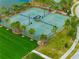 Aerial view of community tennis courts at 14350 Easy Goer St, Ruskin, FL 33573