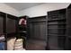 Large walk-in closet with ample shelving and hanging space at 14350 Easy Goer St, Ruskin, FL 33573