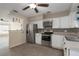 Kitchen with stainless steel appliances and white cabinets at 1504 52Nd E St, Palmetto, FL 34221