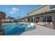 Relaxing backyard oasis with a sparkling pool, spa, and covered patio at 15812 High Bell Pl, Bradenton, FL 34212