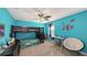 bedroom with bunk beds, desk, and fun decor at 15812 High Bell Pl, Bradenton, FL 34212