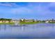 Stunning view of the community lake with fountains at 15812 High Bell Pl, Bradenton, FL 34212