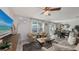 Spacious living area with adjacent dining space and access to backyard at 15812 High Bell Pl, Bradenton, FL 34212