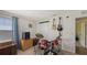 Music room with drum set, guitars, and amplifier at 15812 High Bell Pl, Bradenton, FL 34212