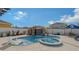 Resort-style pool with waterfall, spa, and lounge chairs at 15812 High Bell Pl, Bradenton, FL 34212