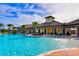 Expansive pool with a luxurious clubhouse at 15812 High Bell Pl, Bradenton, FL 34212