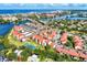 Aerial view of community by the ocean, featuring tennis courts at 1626 Stickney Point Rd # 26-102, Sarasota, FL 34231