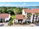 Aerial view of condo community near the water at 1626 Stickney Point Rd # 26-102, Sarasota, FL 34231