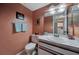 Small bathroom with a toilet and single sink vanity at 1626 Stickney Point Rd # 26-102, Sarasota, FL 34231
