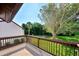 Spacious deck with views of the backyard and lush landscaping at 1626 Stickney Point Rd # 26-102, Sarasota, FL 34231