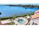 Circular pool with surrounding patio and lounge chairs at 1626 Stickney Point Rd # 26-102, Sarasota, FL 34231