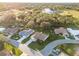 Aerial view of house and surrounding neighborhood at 1726 Killdeer Cir, Venice, FL 34293