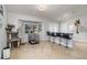 Breakfast bar with seating and view to backyard at 1726 Killdeer Cir, Venice, FL 34293