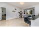 Breakfast bar with seating, cat tree, and dog cage at 1726 Killdeer Cir, Venice, FL 34293