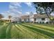 Single-story home with tile roof and nicely landscaped yard at 1726 Killdeer Cir, Venice, FL 34293