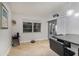 Eat-in kitchen with view to backyard and access to patio at 1726 Killdeer Cir, Venice, FL 34293