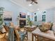 Cozy living room features fireplace, hardwood floors, and comfortable seating at 1810 Lincoln Dr, Sarasota, FL 34236