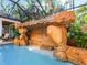 Relaxing pool area with a waterfall feature at 1810 Lincoln Dr, Sarasota, FL 34236