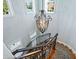 Overhead view of a curved staircase with chandelier at 1810 Lincoln Dr, Sarasota, FL 34236