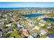 Aerial view of house and surrounding neighborhood at 212 Hibiscus St, Nokomis, FL 34275