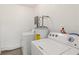 Laundry room with a washer and dryer setup with utilities at 21907 Cellini Ave, Port Charlotte, FL 33952