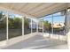 Screened-in patio providing an outdoor space with views of the backyard at 21907 Cellini Ave, Port Charlotte, FL 33952
