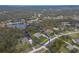 Aerial view of a single Gathering home and surrounding neighborhood at 22343 Panther Loop, Bradenton, FL 34202