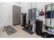 Well-equipped garage featuring water softener, electrical panel and storage at 22343 Panther Loop, Bradenton, FL 34202