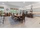 Open kitchen with granite island and stainless steel appliances at 22343 Panther Loop, Bradenton, FL 34202