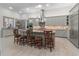 Island kitchen with granite countertops and stainless steel appliances at 22343 Panther Loop, Bradenton, FL 34202