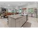 Spacious kitchen with granite countertops and stainless steel appliances at 22343 Panther Loop, Bradenton, FL 34202