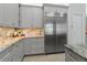 Luxury kitchen with stainless steel appliances and granite countertops at 22343 Panther Loop, Bradenton, FL 34202
