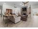 Open living space with large sectional sofa and stone fireplace at 22343 Panther Loop, Bradenton, FL 34202