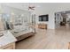 Spacious main bedroom with large TV and sitting area at 22343 Panther Loop, Bradenton, FL 34202