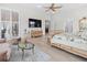 Main bedroom features sitting area and large TV at 22343 Panther Loop, Bradenton, FL 34202