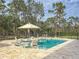 Enjoy this expansive pool and patio area, perfect for relaxation and entertaining at 22343 Panther Loop, Bradenton, FL 34202