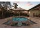 Inviting swimming pool with built-in seating and lounge chairs at 22343 Panther Loop, Bradenton, FL 34202