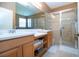 Bathroom with double vanity, large shower, and updated fixtures at 236 Golden Harbour Trl, Bradenton, FL 34212