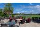 Fire pit with scenic golf course view at 236 Golden Harbour Trl, Bradenton, FL 34212