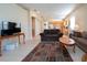 Spacious living room with tile flooring, sofas, and coffee table at 236 Golden Harbour Trl, Bradenton, FL 34212
