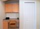 Small home office with built-in desk and cabinets at 236 Golden Harbour Trl, Bradenton, FL 34212
