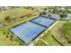 Several well-maintained tennis courts at 236 Golden Harbour Trl, Bradenton, FL 34212